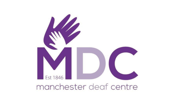 Manchester Deaf Centre logo, purple hand singing